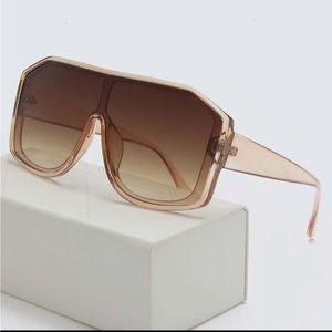 Tan frame glasses